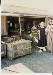 Donna Hallberg (Hallberg-Marovich and Marcia Hallberg in vintage costumes at the Hallberg Apple Farm roadside stand 1982