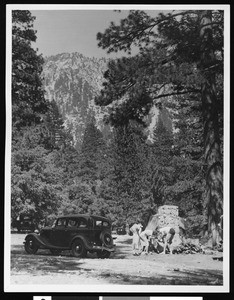Campers building a campfire at Crystal Lake, ca.1930