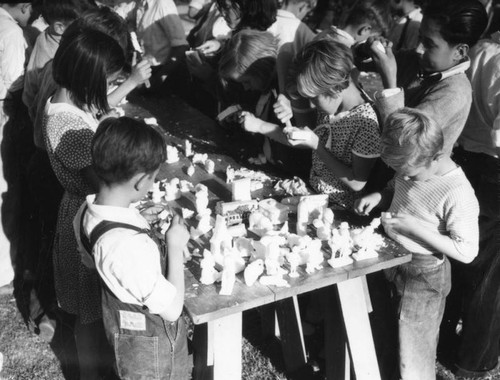 Children learning soap sculpture, view 4