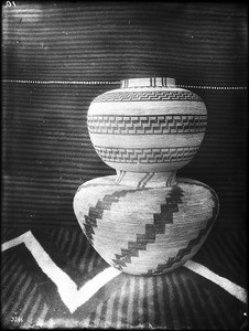 Two Indian baskets on display, ca.1900
