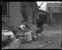 Weizel family living outside of their house after the earthquake, Long Beach, 1933