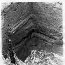 Photographs from Old Sacramento City Hotel Excavations, open pit partially covered in plastic for protection