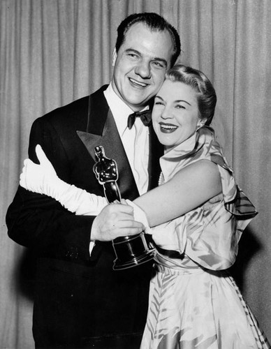 Karl Malden holding an Oscar