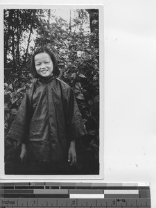 A young woman leaving to study for the native sisterhood at Luojing, China, 1935