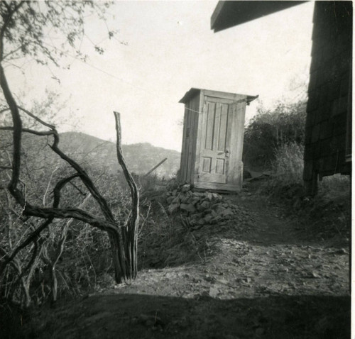 Leaning outhouse of a cabin in Topanga, California