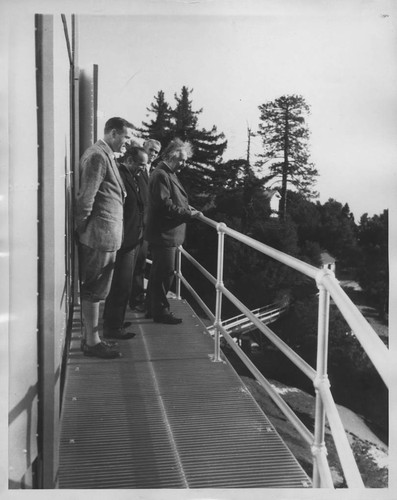Edwin Powell Hubble, Walther Mayer, Walter S. Adams and Albert Einstein standing on the exterior balcony of the 100-inch telescope dome, Mount Wilson Observatory