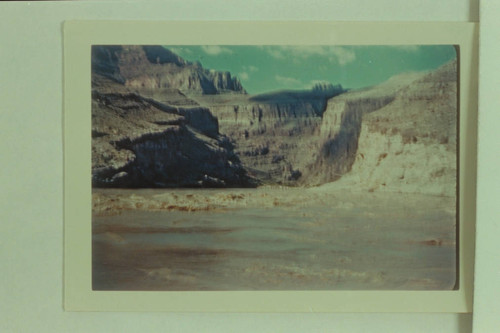 Riffle at the lower end of Unkar Rapid. From approximately Mile 74 1/2. Bright Angel gauge: 18,700 cfs. Characteristic is the rapidly rising strata