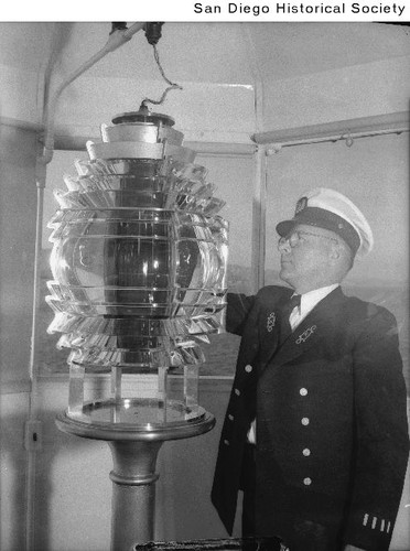 The Ballast Point Lighthouse keeper with the light