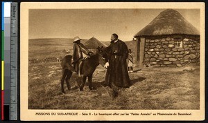Missionary father speaks with a boy on a donkey, Lesotho, ca.1900-1930