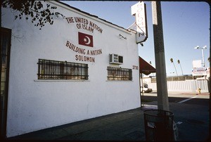 Storefront churches and businesses down Jefferson Boulevard to La Cienega Boulevard, Los Angeles, 2004
