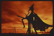 DEC77P6-33: witch sculpture, sunset
