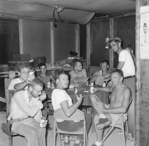 Group socializing during the Capricorn Expedition, Walter Munk in back row (on right), Bikini Atoll