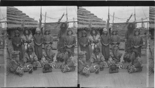 Ainu men, the aborigines of Japan in feast attire, Island of Yezo