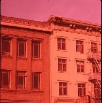 View of the buildings in the West End before demolition or reconstruction. It is the area that would become Old Sacramento. This view is Block 228 at 217-221 J Street
