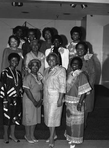Alpha Gamma Omega forum participants posing together, Los Angeles, 1985
