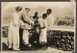 Dr. Taube with nurse and patient, Tanzania, ca.1910-1914