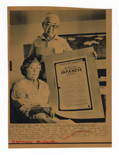 Al and Mary Tsukamoto with copy of executive order 9066