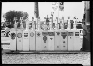 Line of different brands of oils, Southern California, 1933