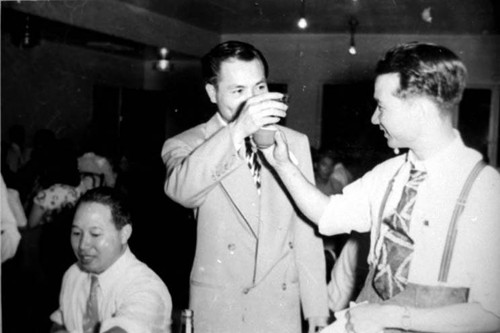 Wedding banquet, Nelson Moy (of United Poultry), groom, center, and Chester Quon