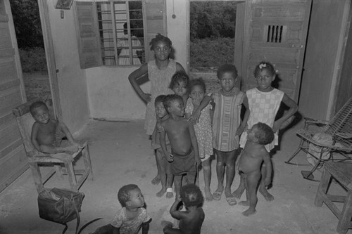 Groupf of children standing inside a home, San Basilio de Palenque, 1976