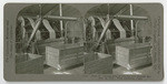 Wool 17. Dyeing bolts of felt run over through dye vats on reels. West Alhambra, Calif., 131