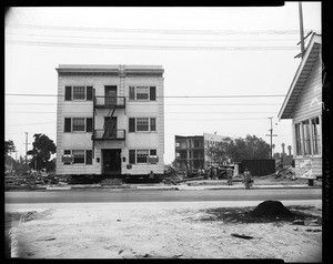 Building moved for freeway, 1954