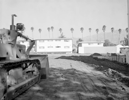 View of the dirt lot after the destruction of the gardener's cottage, garages and telescope erecting house, Santa Barbara Street, Pasadena