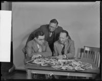 Robert Kenny, Fred Dapprich, and C. J. Ver Halen, judging the Los Angeles Times Amateur Snapshot Contest, Los Angeles, 1935