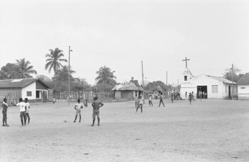 Boys playing football, San Basilio de Palenque, 1977