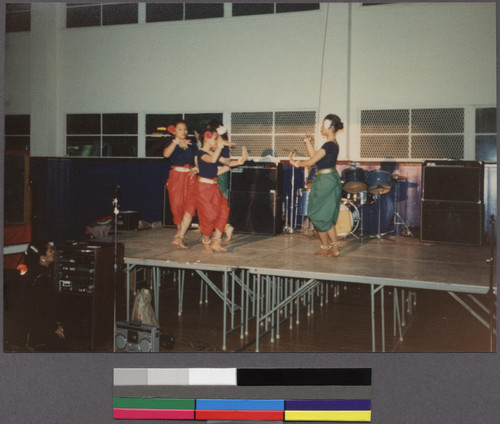 Girls dancing on stage at a singing festival