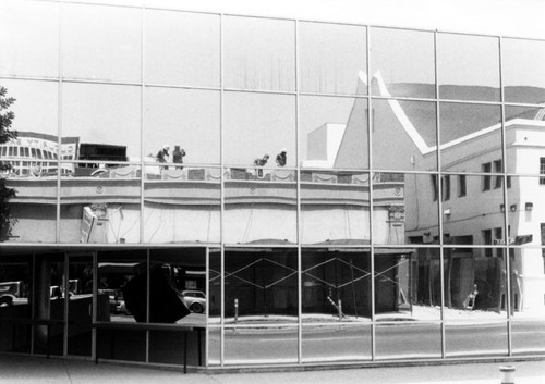 Santa Ana Hotel and First Presbyterian Church mirrored in the office building at the corner of Santa Ana Blvd and Main Street, 1987