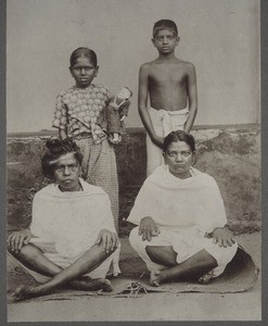 Basel Mission. 33. Mother with leprosy, with her children. India