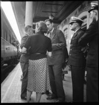 [Men and woman with United States naval officers on train platform. Vilar Formoso, Portugal]
