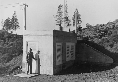 Cement housing for the seismograph during construction of Shasta Dam