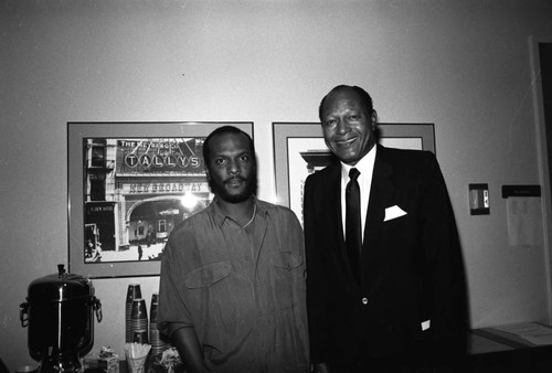 George Howard and Tom Bradley posing together at the 11th Annual BRE Conference, Los Angeles, 1987