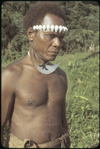 Man with dafi on neck and tale'ekalango on forehead