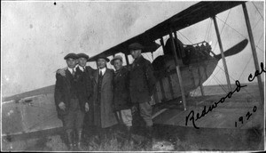 Young Lee, Byun Hoon Chang, Charles Lee and two others in front of plane