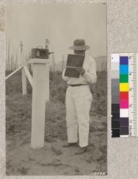 J. V. Hoffmann and automatic humidity recorder at Wind River Station. U.S. Forest Service