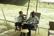 Dorothy Solomon and Unidentified Child Reading, Jonestown, Guyana