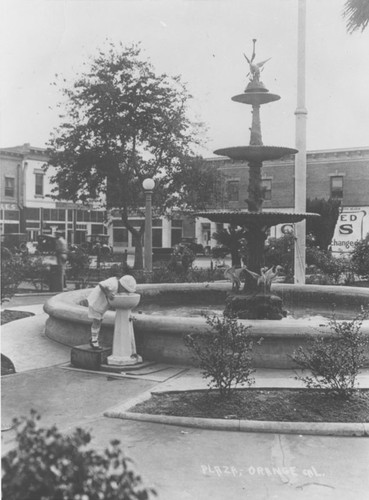 The Plaza with fountain, Orange, California, ca. 1920