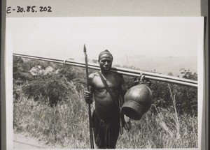 A wine-carrier or farmer from Nsungli