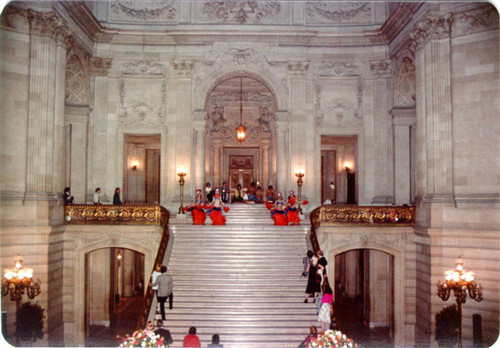 [Dancers performing on the main staircase of the Rotunda at City Hall]