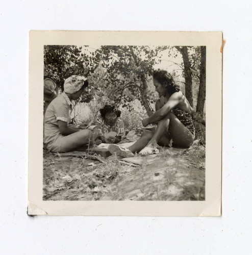 Young women playing cards