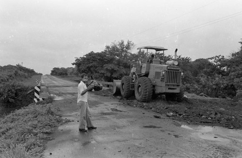 Sandinista stands near a bridge, Nicaragua, 1979
