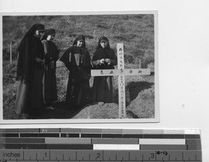 Sisters at Sister Anastasia's grave at Fushun, China, 1940