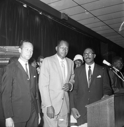 Douglas Dollarhide standing with Tom Bradley at a mayoral campaign event, Los Angeles, 1969