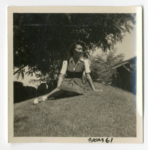 Photograph of a girl in Manzanar garden