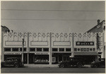 [Exterior full front view retail storefronts, 2427 North Broadway, Los Angeles]