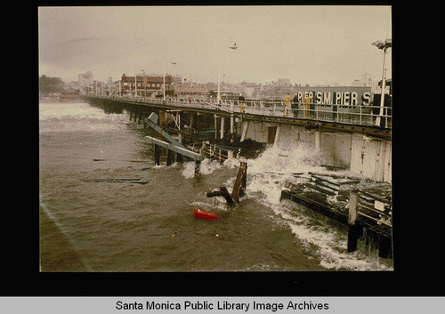 Santa Monica Pier battered from storm damage on January 27, 1983