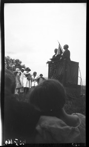 European man standing on an outdoor pulpit, southern Africa